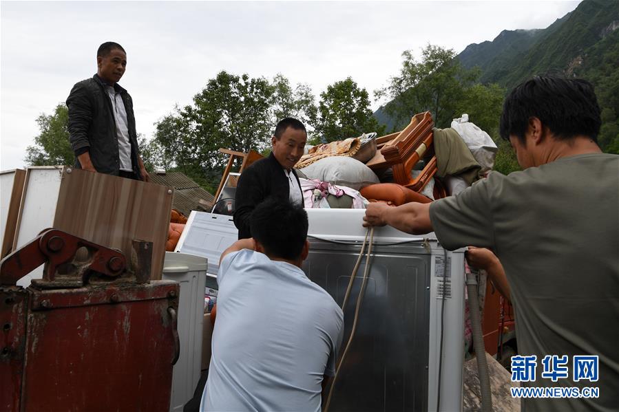 （新華全媒+）（9）千里“挪窩”，踏實開啟新生活