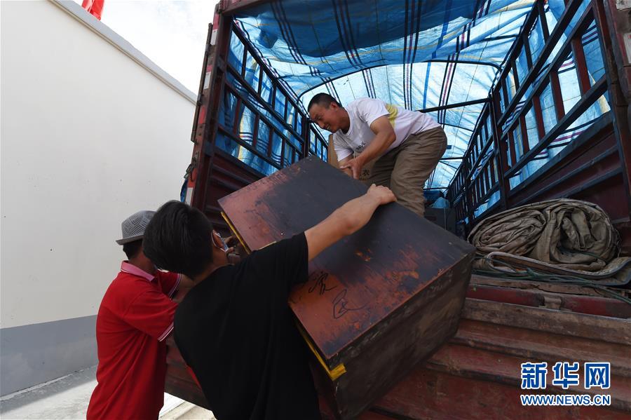 （新華全媒+）（26）千里“挪窩”，踏實開啟新生活