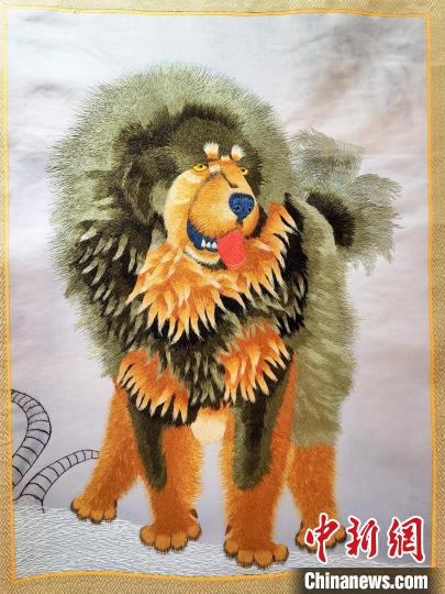 圖為藏繡作品?！∑钤鲚?攝