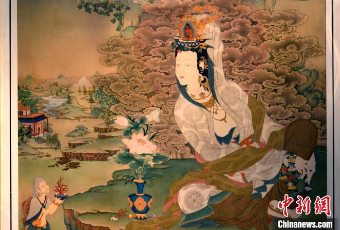 圖為5月16日，展覽中新創(chuàng)唐卡作品《靜息觀音》(局部)。　李林 攝